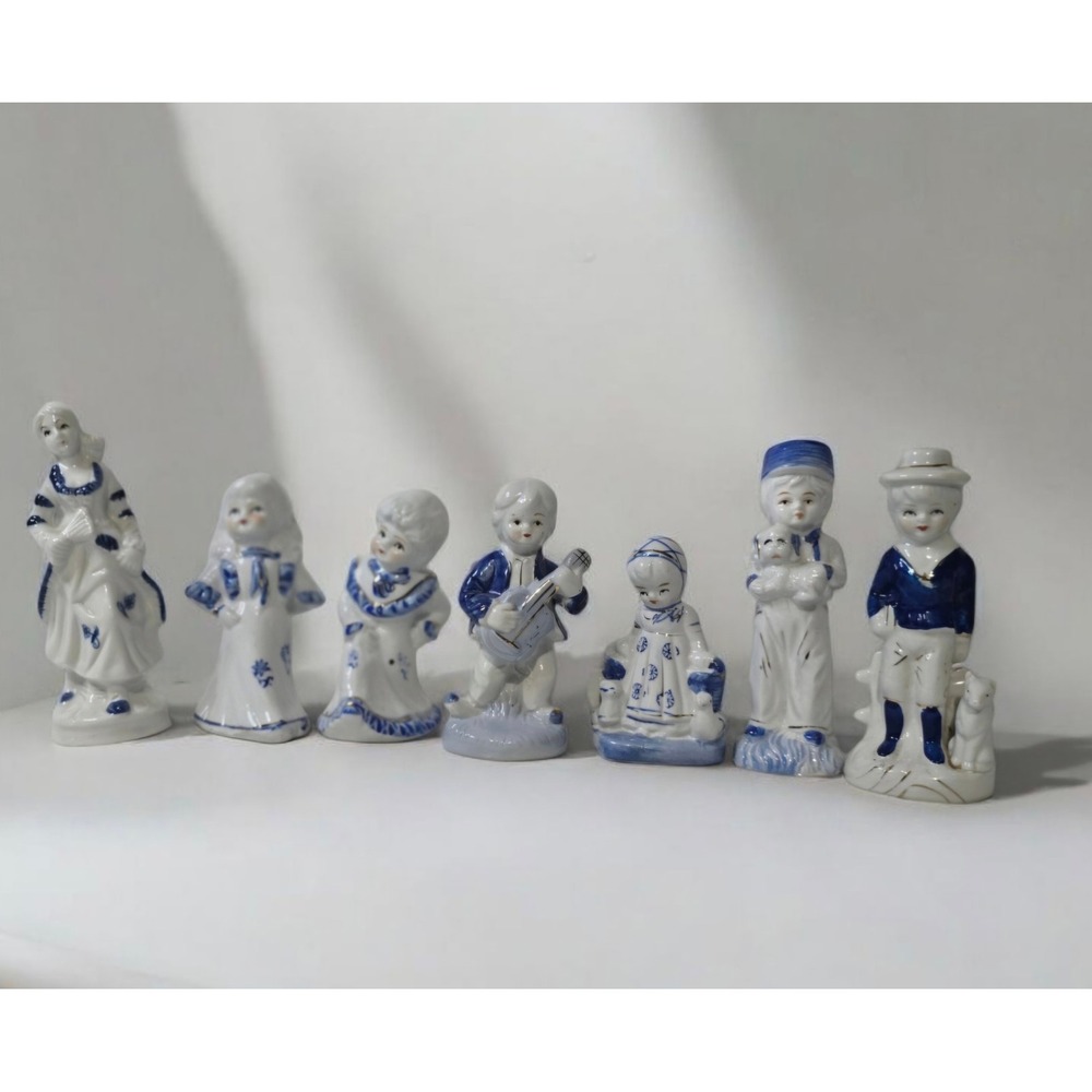 Lot of 7 Vintage Blue and White Porcelain Figurines Victorian Colonial set